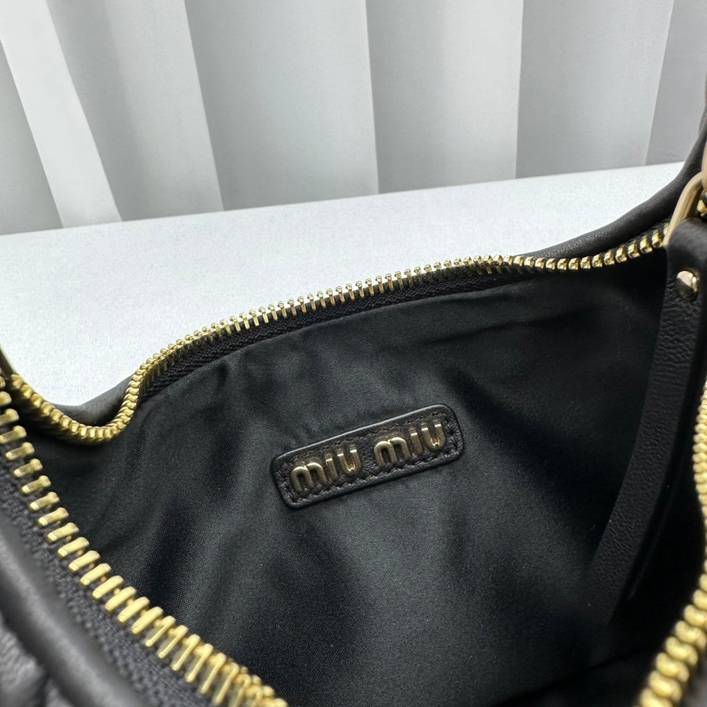 Mala MIU MIU